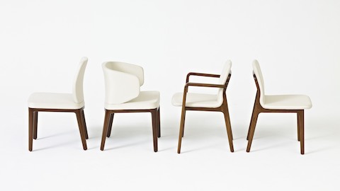 Side view of four Geiger side chairs, including an armless A Line, a wingback A Line, a Deft with arms, and an armless Deft.