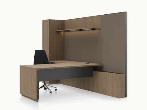 A Geiger One Private Office in Natural Flat Cut Walnut featuring a height-adjustable Cascade leg with a Clamshell Chair viewed from a 45 degree angle.