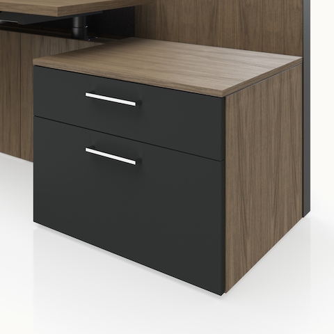 Detail shot of the Geiger One Casegoods storage with a Natural Flat Cut Walnut case and Charcoal TFL fronts.