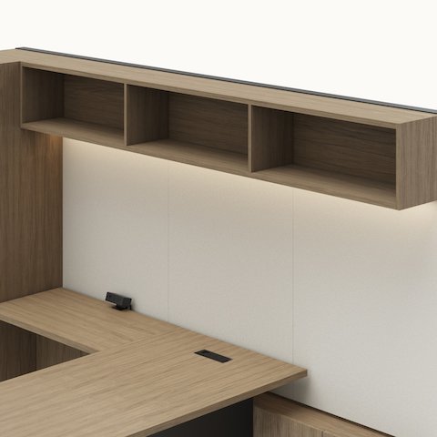 Detail shot of the Geiger One Casegoods open overhead option in a Natural Flat Cut Walnut private office viewed from an angle.