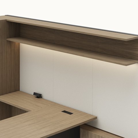 Detail shot of the Geiger One Casegoods open double shelf overhead option in a Natural Flat Cut Walnut private office viewed from an angle.