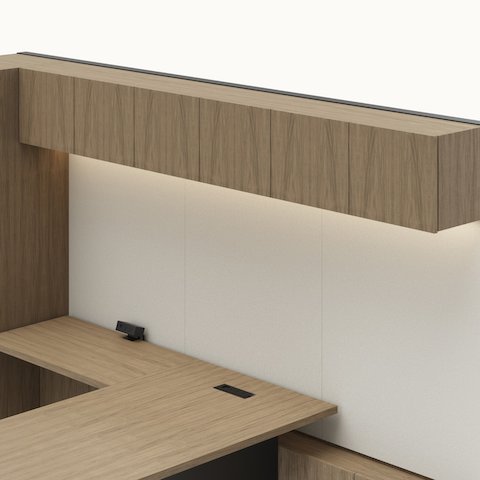 Detail shot of the Geiger One Casegoods overhead with hinged doors option in a Natural Flat Cut Walnut private office viewed from an angle.