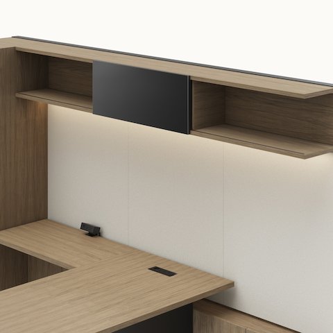 Detail shot of the Geiger One Casegoods open double shelf with sliding door overhead option in a Natural Flat Cut Walnut private office viewed from an angle.