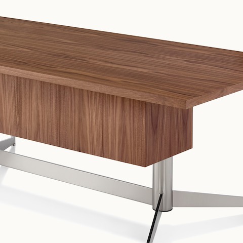 Partial angled view of a rectangular MP Height-Adjustable Table, focusing on the modesty panel.